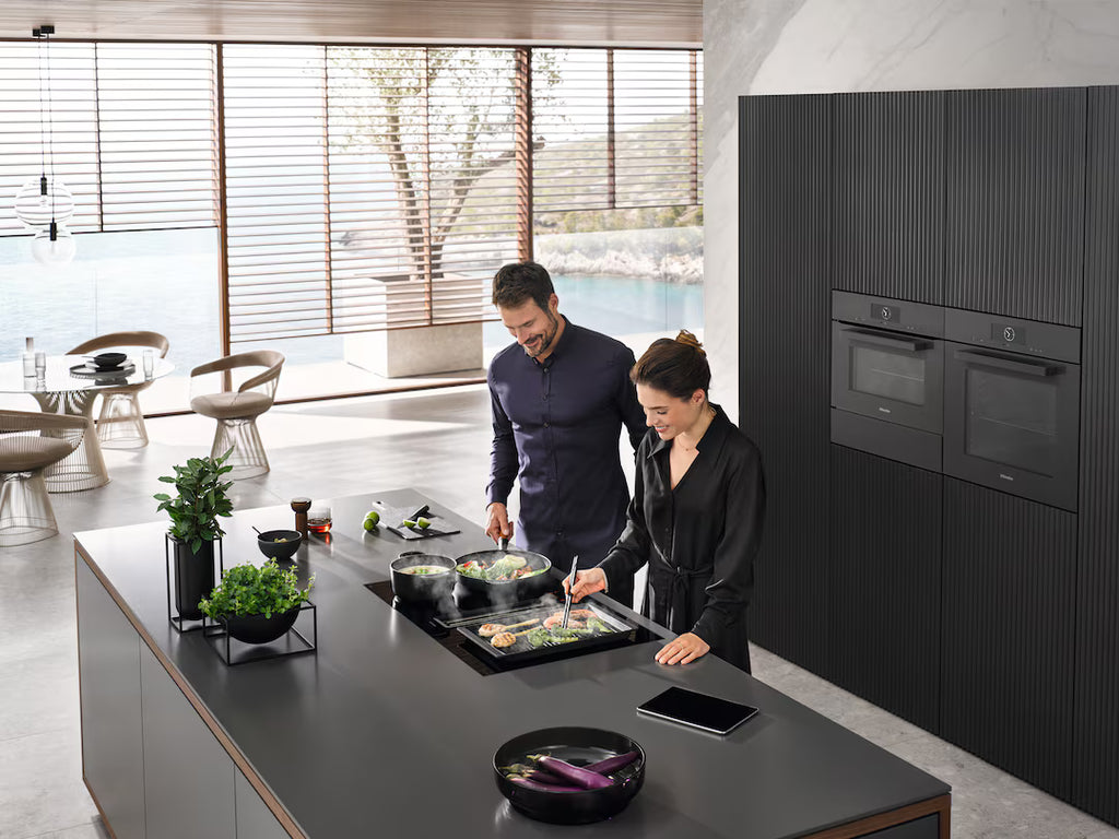 Induktionshäll med integrerad fläkt Miele KMDA 7473-1 FL Silence
